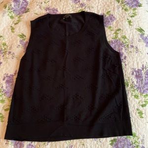 black sleeveless top with bauble detailing